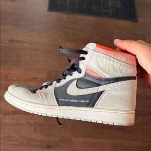 Nike Air Jordan 1 High OG in Black, White, and Orange
